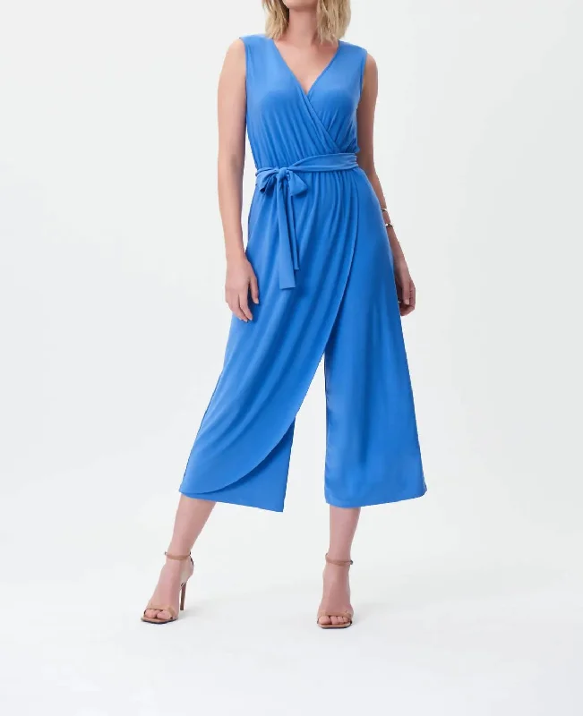 Bold patterned tight trousers for women with geometric or floral prints for unique look -Iris Belted Jumpsuit In Blue