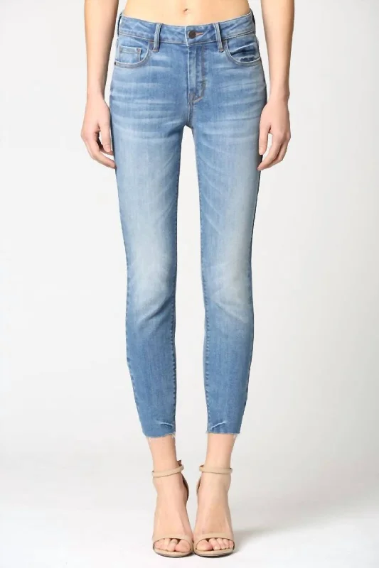 Denim tight trousers for women with skinny fit and timeless blue wash -Medium Wash Raw Hem Jean In Blue