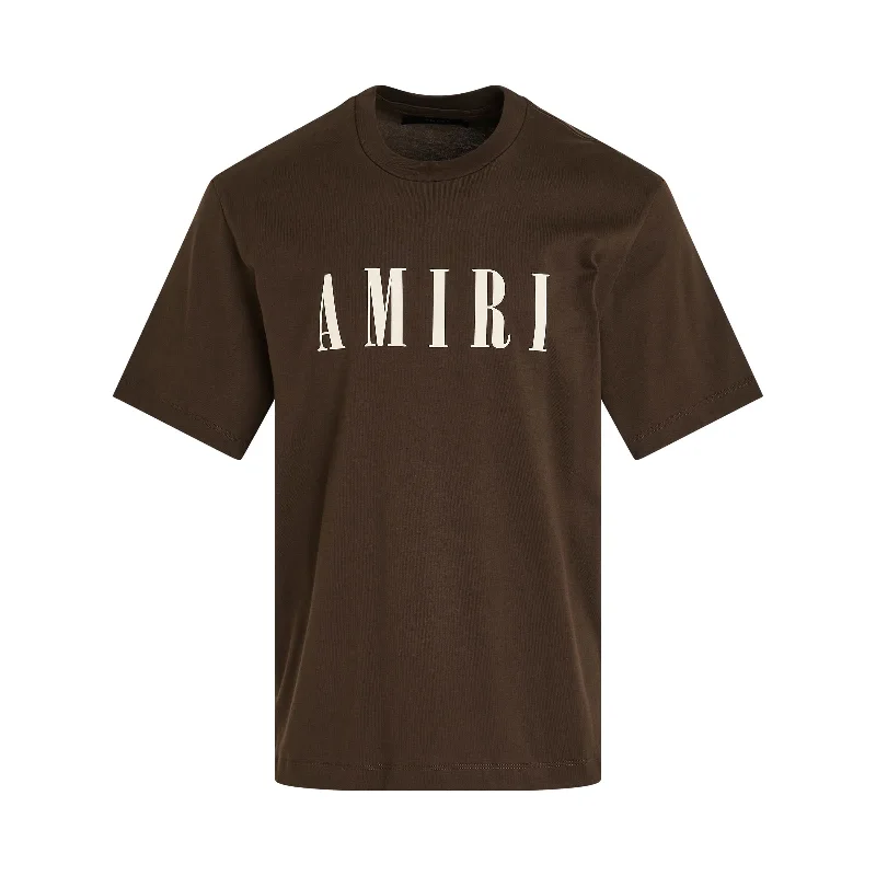 Foldable travel backpack for easy packing convenience -Amiri Core Logo T-Shirt in Brown