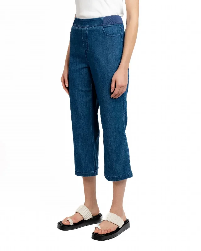 Retro-inspired tight trousers for men with a high-waisted fit and 80s vibe -Crop Denim Pant In Indigo