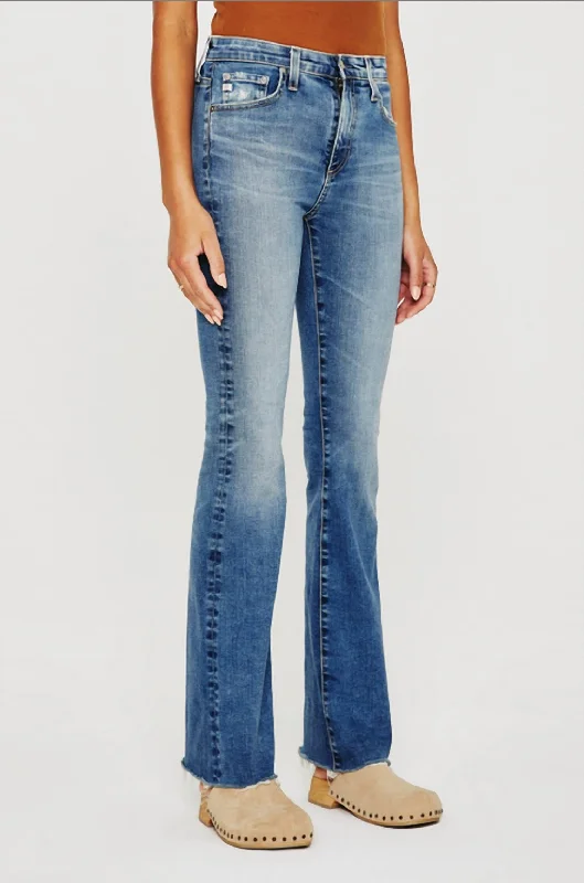 High-rise tight trousers for women with pleated front and classic look -Denim Farrah Boot Jeans In Medium Indigo Wash