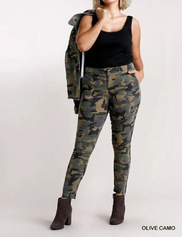 Fashion-forward tight trousers for women with metallic sheen and edgy design -Slim Leg Plus Pants With Zipper Detail In Green Camo