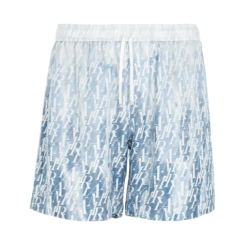 Small sling backpack for quick city errands -Gradient Amiri Repeat Shorts in Ashley Blue