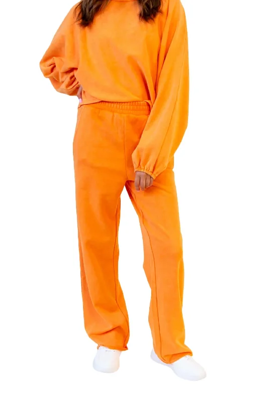 Casual tight trousers for women with comfy waistband and minimalistic style -Clubs Washed Sweatpants In Washed Orange