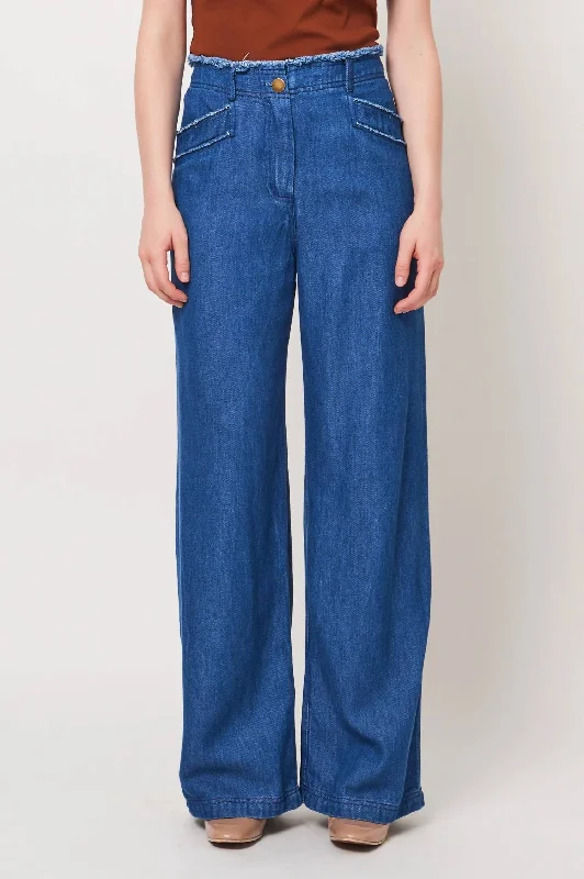 Retro-inspired tight trousers for men with a high-waisted fit and 80s vibe -Lynn Pant In Washed Indigo